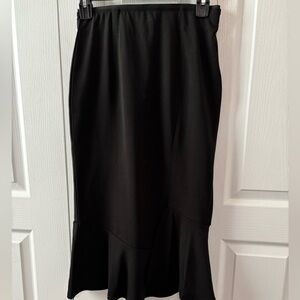 Shein women’s black midi skirt. Small. Elastic waist .